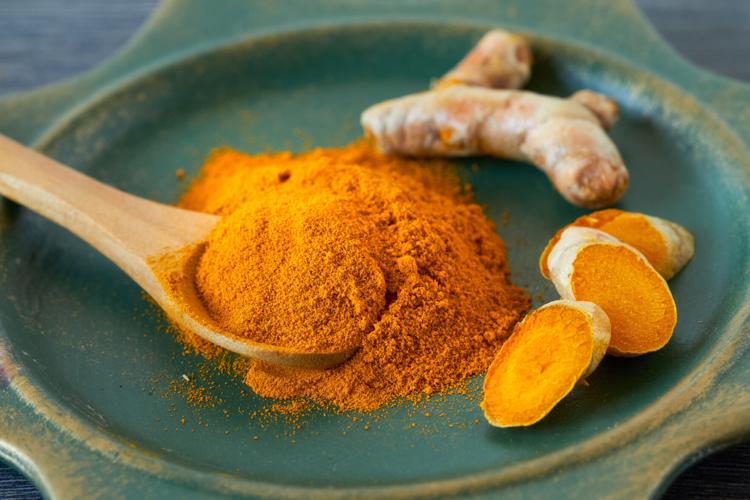 4 ‘superfoods’ to fuel up on right now stock photo turmeric