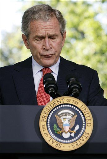 Bush says he's working hard on economic turmoil  