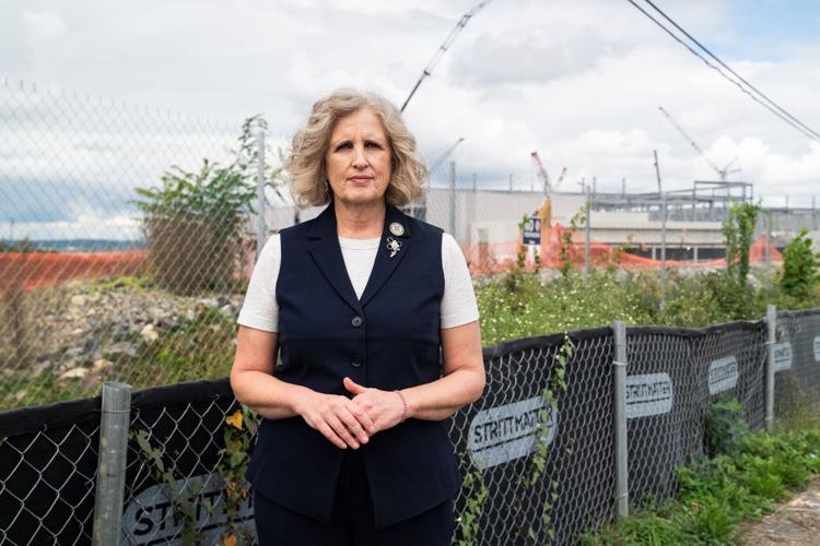 Juli Briskman, a member of the Loudoun County board of supervisors, poses for a portrait near the construction site of a data center on Sept. 28, 2026. Briskman has called for a moratorium on data center construction as residents have increasingly pushed b