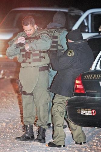 Armed smugglers fighting it out  