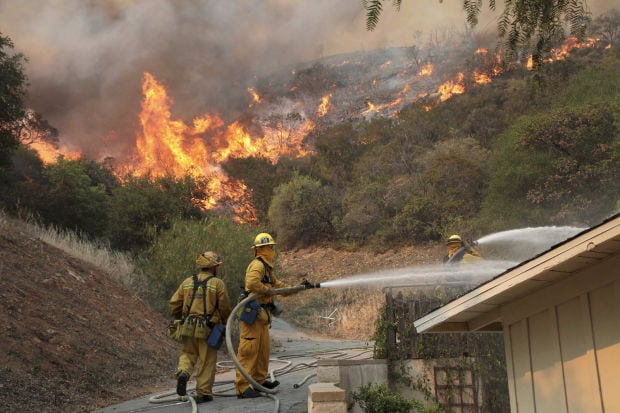 S. Calif. fire spreads; up to 15 homes damaged