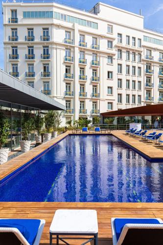Strong 'White Lotus' vibes off the swimming pool at the Hotel Martinez.