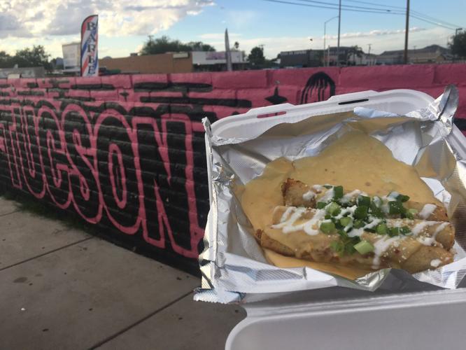 Rollies Mexican Patio rolled chicken tacos and mural