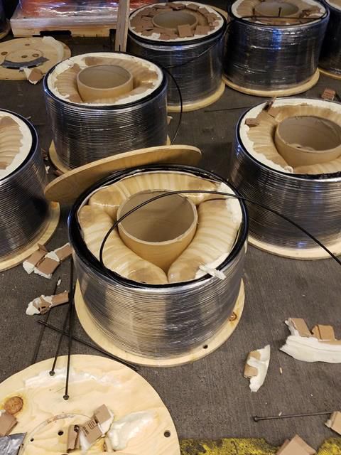 Marijuana in wooden spools