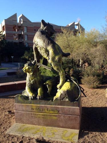 UA Mall's 'Wildcat Family' sculpture spray painted yellow