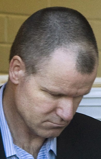 Top officer exposed as killer-rapist gets prison   