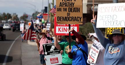 Hundreds turn out for 'No Kings' rally in Tucson in strong winds