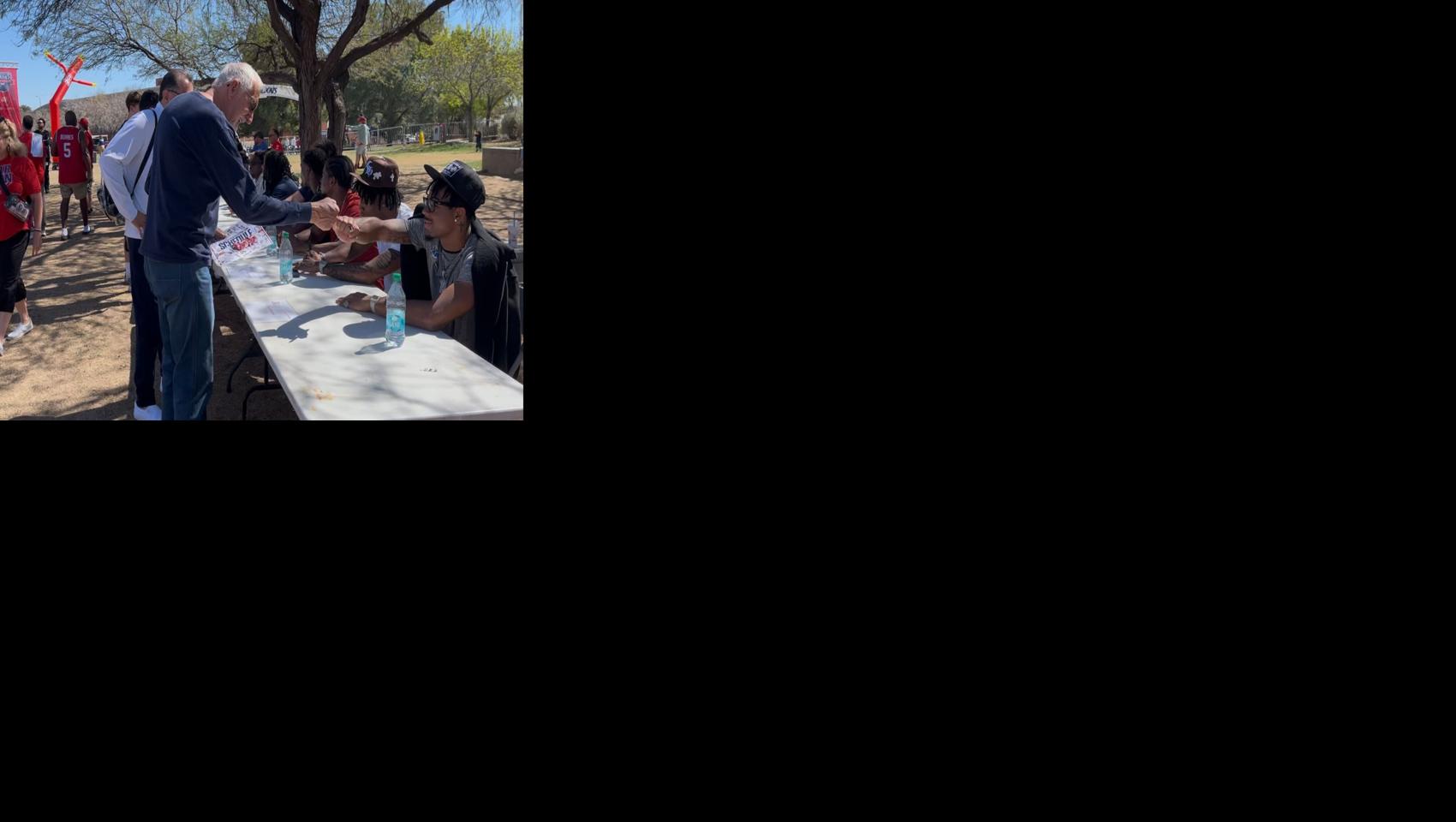 Fist bump at Bear Down Bash