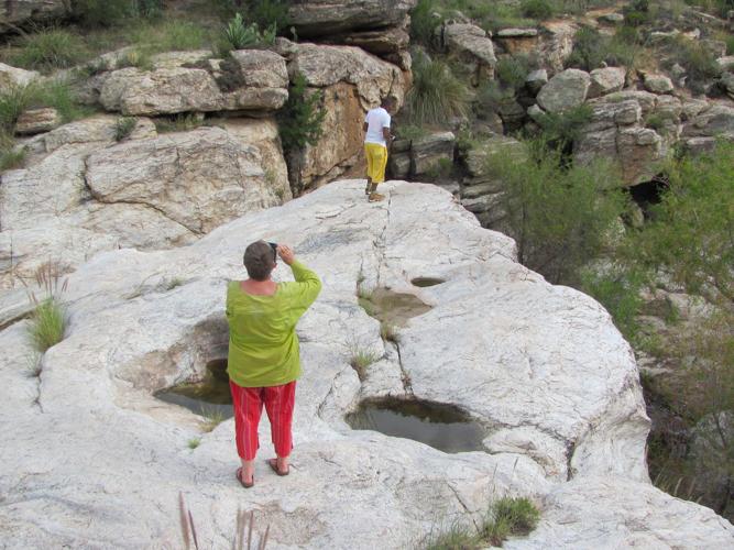 Hikers near water pockets
