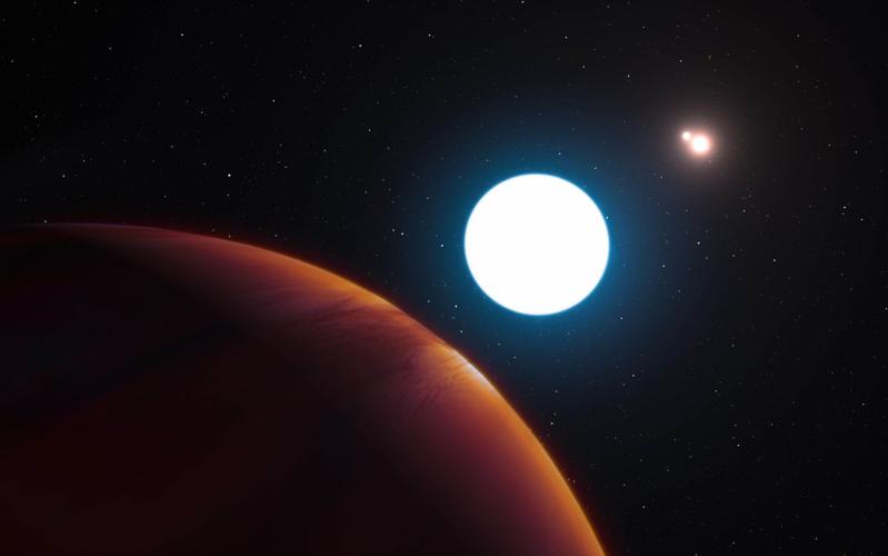 UA astronomers find planet with three suns