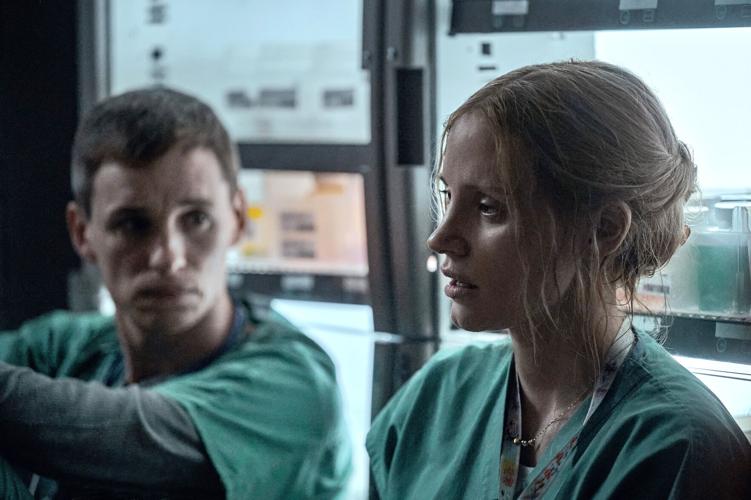 Eddie Redmayne, left, as Charlie Cullen and Jessica Chastain as Amy Loughren in "The Good Nurse" on Netflix.