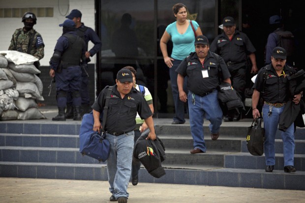 All police fired in key Mexican port city   