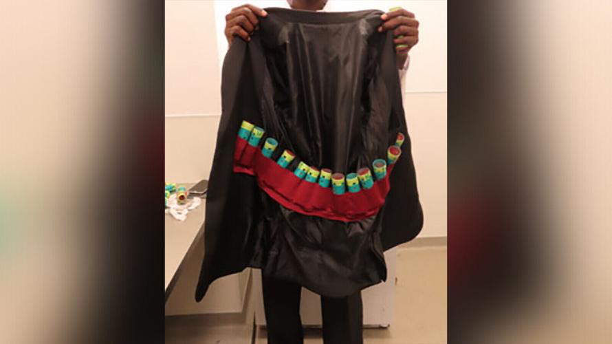 Man arrested at airport after 35 birds intended for singing contests found in his clothing, officials say