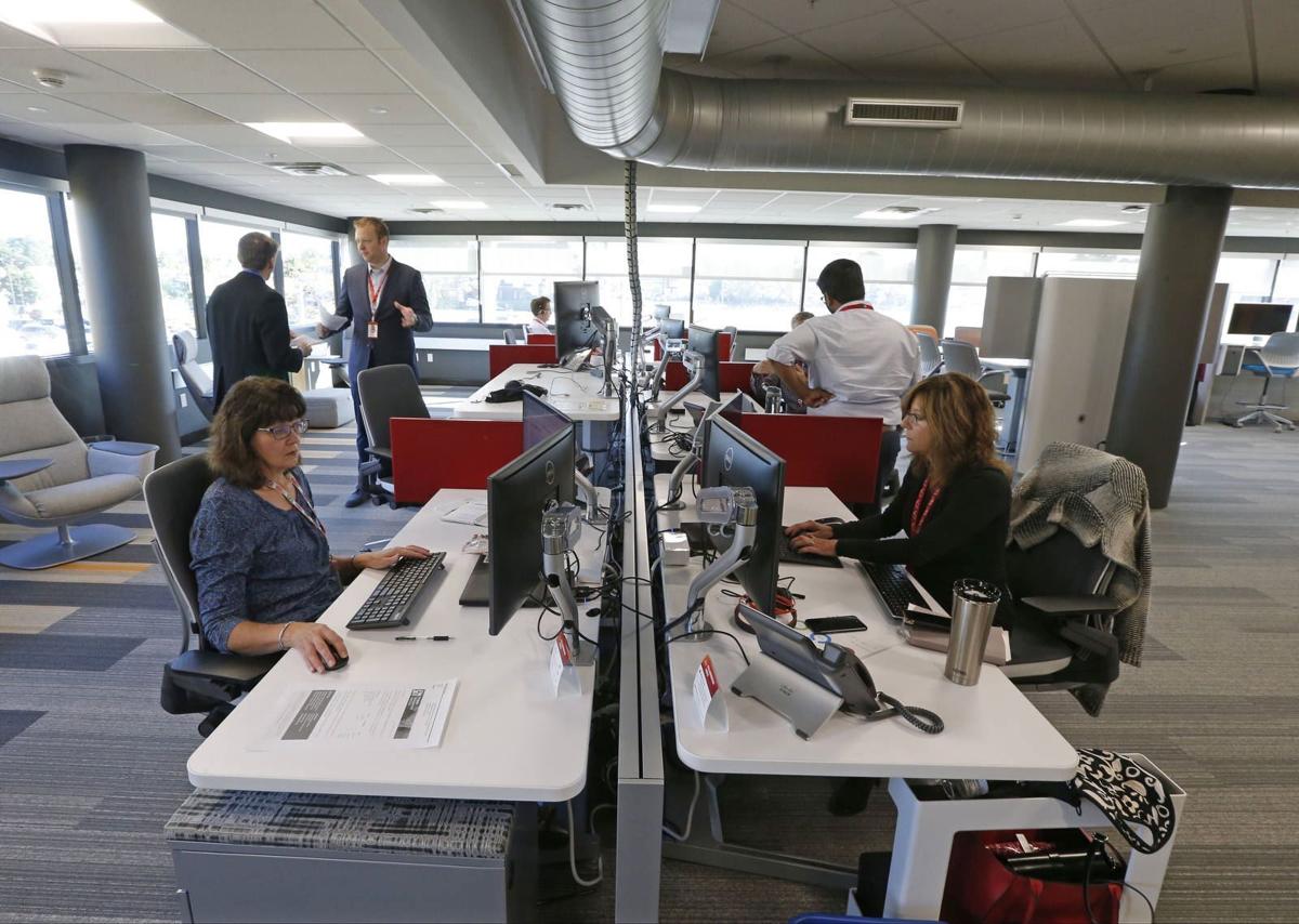 As workers return to offices, hybrid schedules take root