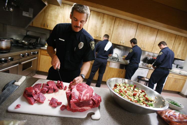 TFD firefighters cooking at Station 7 in 2013