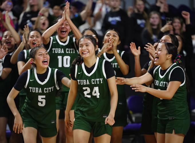 Tuba City guard Layla Curtis (24) reacts after being named Championship game MVP after Tuba City beat Snowflake during the Copper Division Championship game at Arizona Veterans Memorial Coliseum in Phoenix on Feb. 28, 2026.
