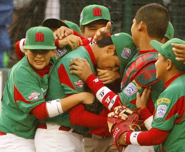 Mexico eliminates Puerto Rico; rain halts two US games