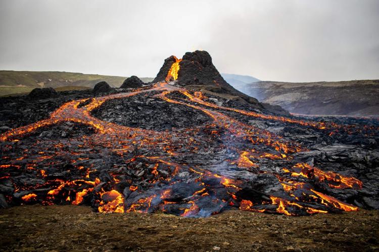 Icelandic man gets naked next to erupting volcano