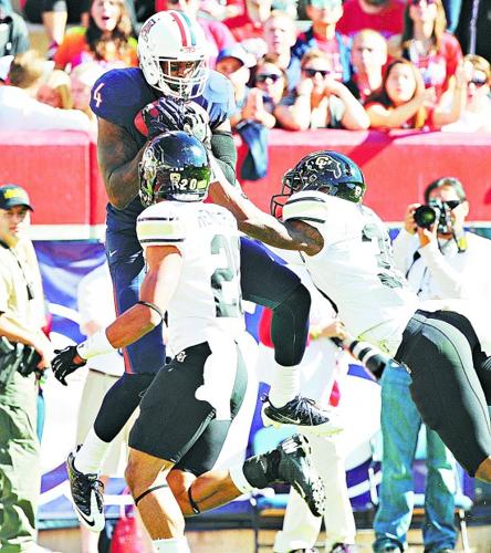 ARIZONA 56 Colorado 31: Buffs left in dust    