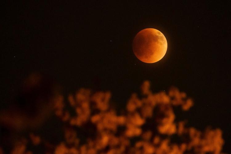 Total lunar eclipse creates dazzling 'blood moon'