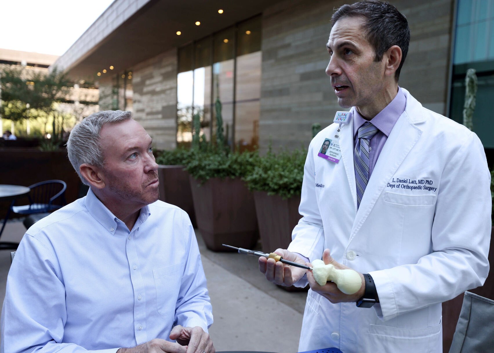 Dr. Daniel Latt and CEO John Buttery