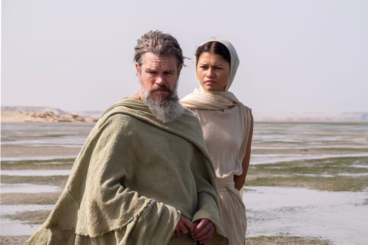 L to R: Matt Damon is Odysseus and Zendaya is Athena in THE ODYSSEY, written, produced, and directed by Christopher Nolan.