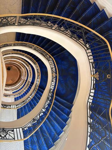 The hotel's blue-carpeted spiral staircase has peppered many a celebrity's camera roll during Cannes Film Festival, which runs May 12-23 this year.