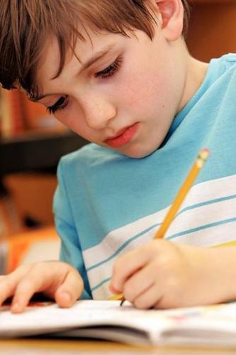First-grader's penmanship is mark of a true champion  