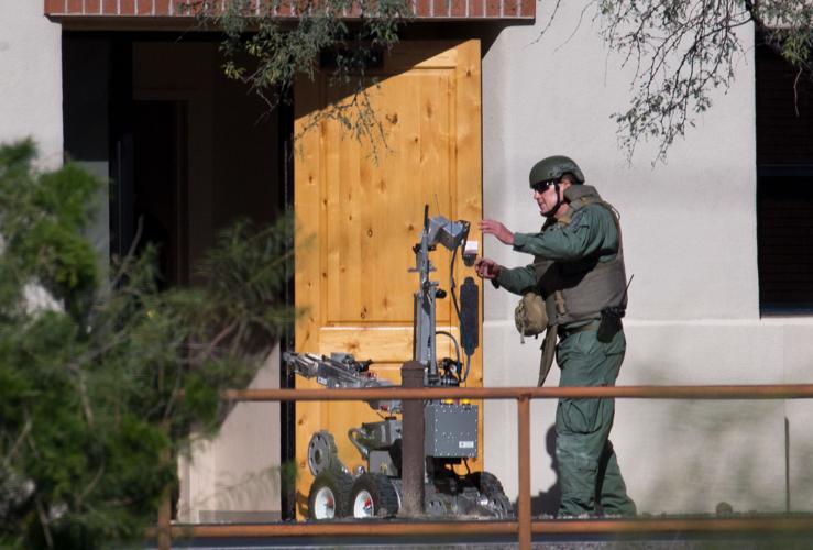 Barricaded man near 1st and River