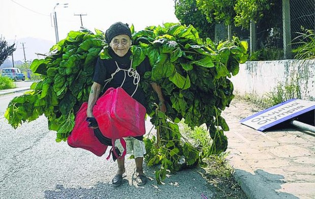 New, old fires rage in Greece  