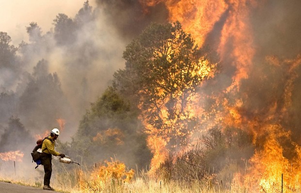 Fire now menaces NM towns   
