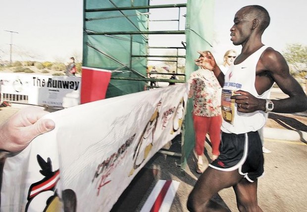Kenyans sweep half-marathon main event  