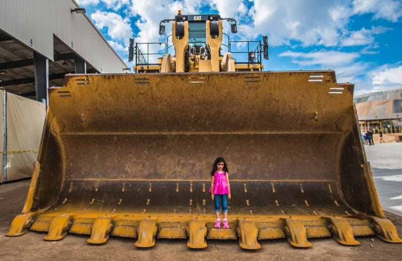 Your photo op with a giant Caterpillar truck is coming up ...