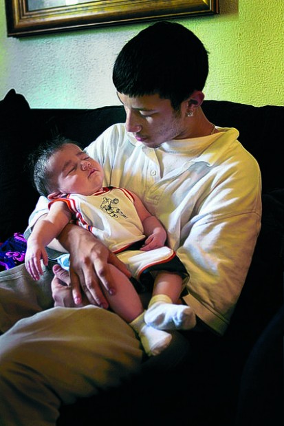 Middle school class teaches infant care to young parents, others  