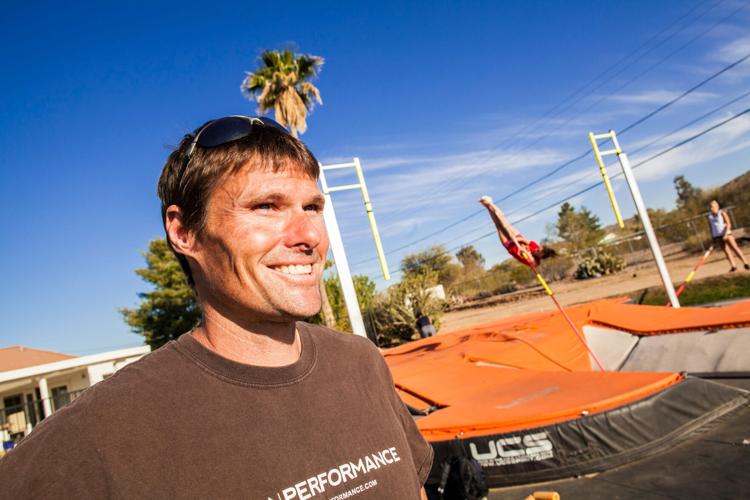 Nick Hysong and his pole vault pit in the backyard of his home in Phoenix. Nick Hysong is a former Olympic pole vaulter who now works with high school kids in the Valley. Arizona State's Hysong won a gold medal in Men’s Track and Field (Pole Vault), in 2