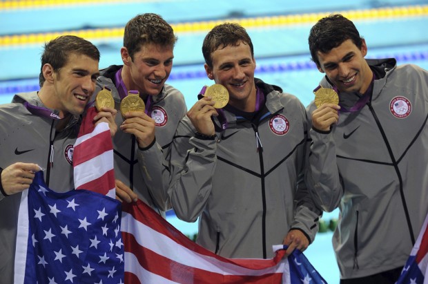 Swimming: Phelps adds 2 medals to set record    