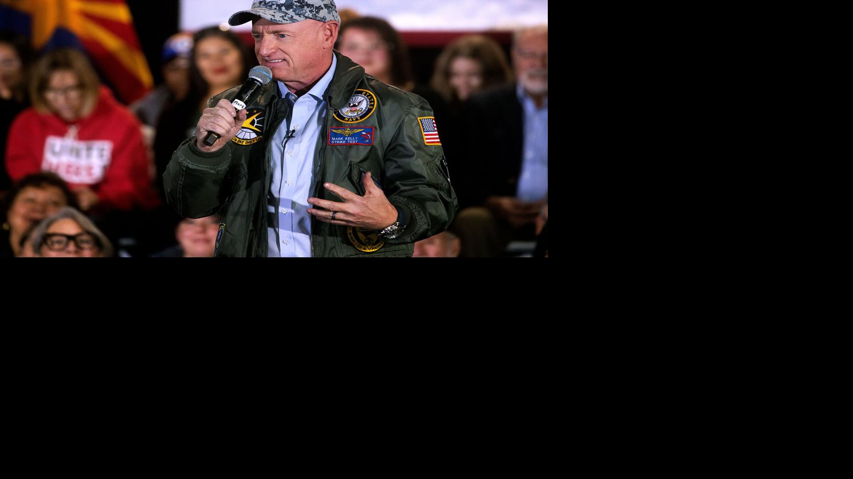 Sen. Mark Kelly talks FBI probe, Venezuela strikes, health care in Tucson town hall