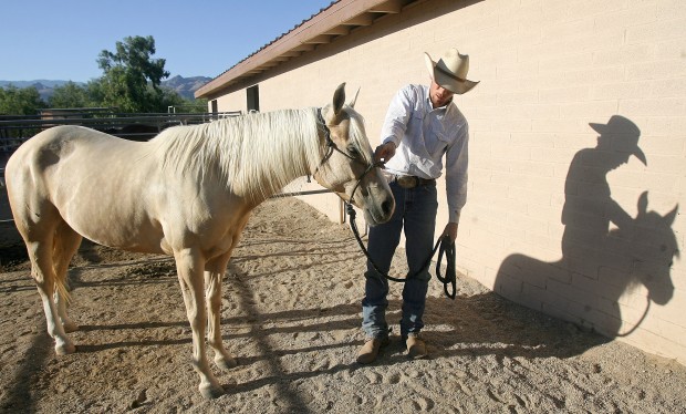 Local trainer rides to prize working with wild horse   