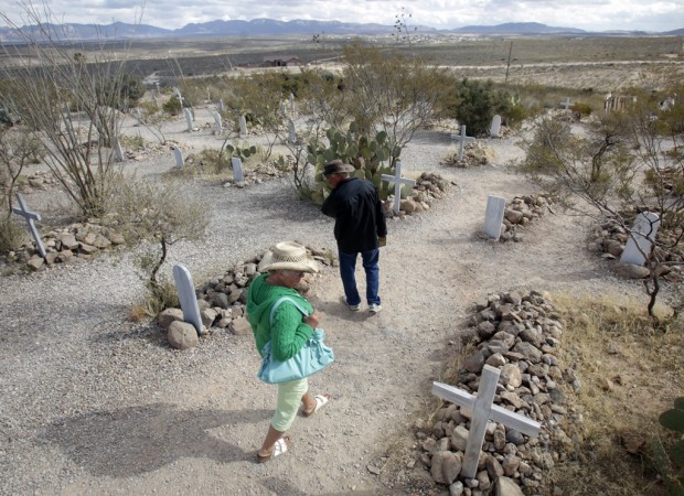 Wood 'headstones' replace inauthentic metal markers