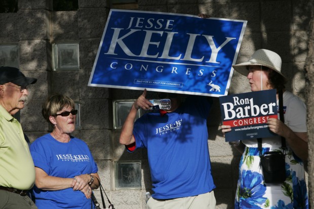 Social Security, health dominate CD8 debate Last forum sees Barber, Kelly staking out familiar ground    