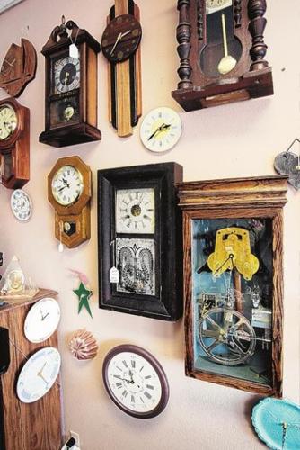 Clock shop keeps hands full  