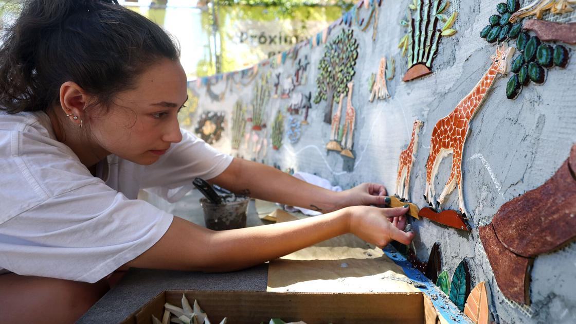 Adding color to pathway at Tucson's Reid Park Zoo