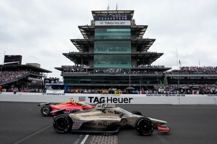 Meyer Shank Racing with Curb Agajanian driver Felix Rosenqvist (60) crosses the Yard of Bricks ahead of Team Penske driver David