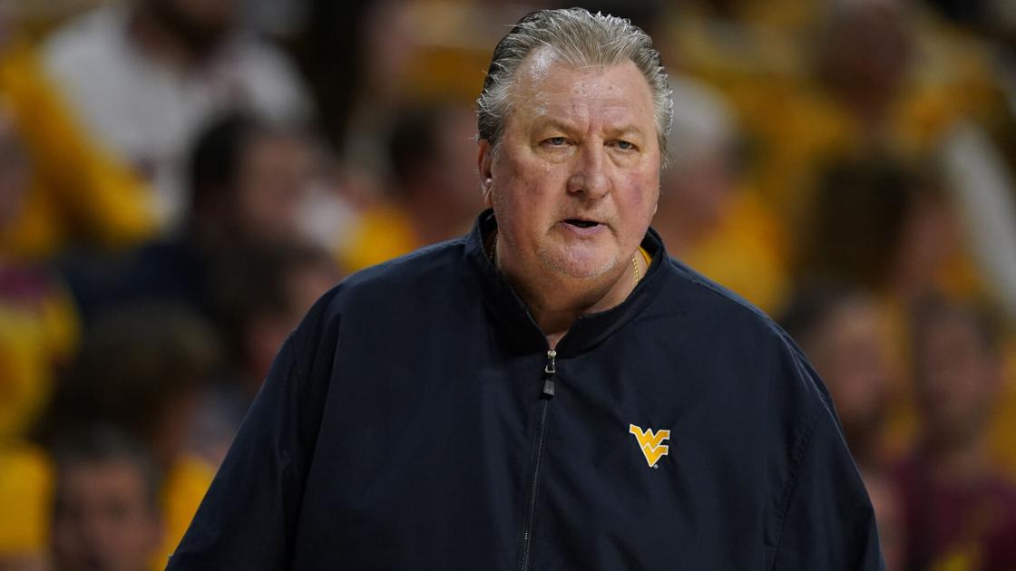 Huggins says he never resigned at WVU, wants job back, attorney claims