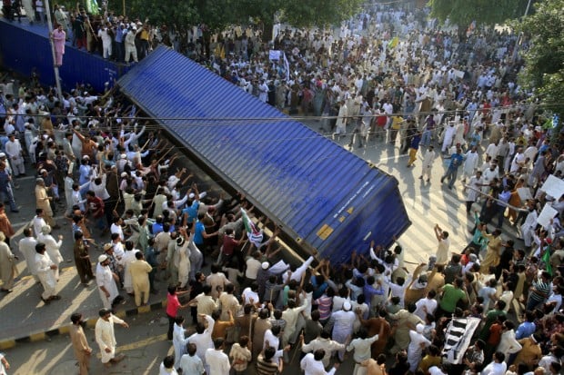 Protests spread across Pakistan; 20 killed    