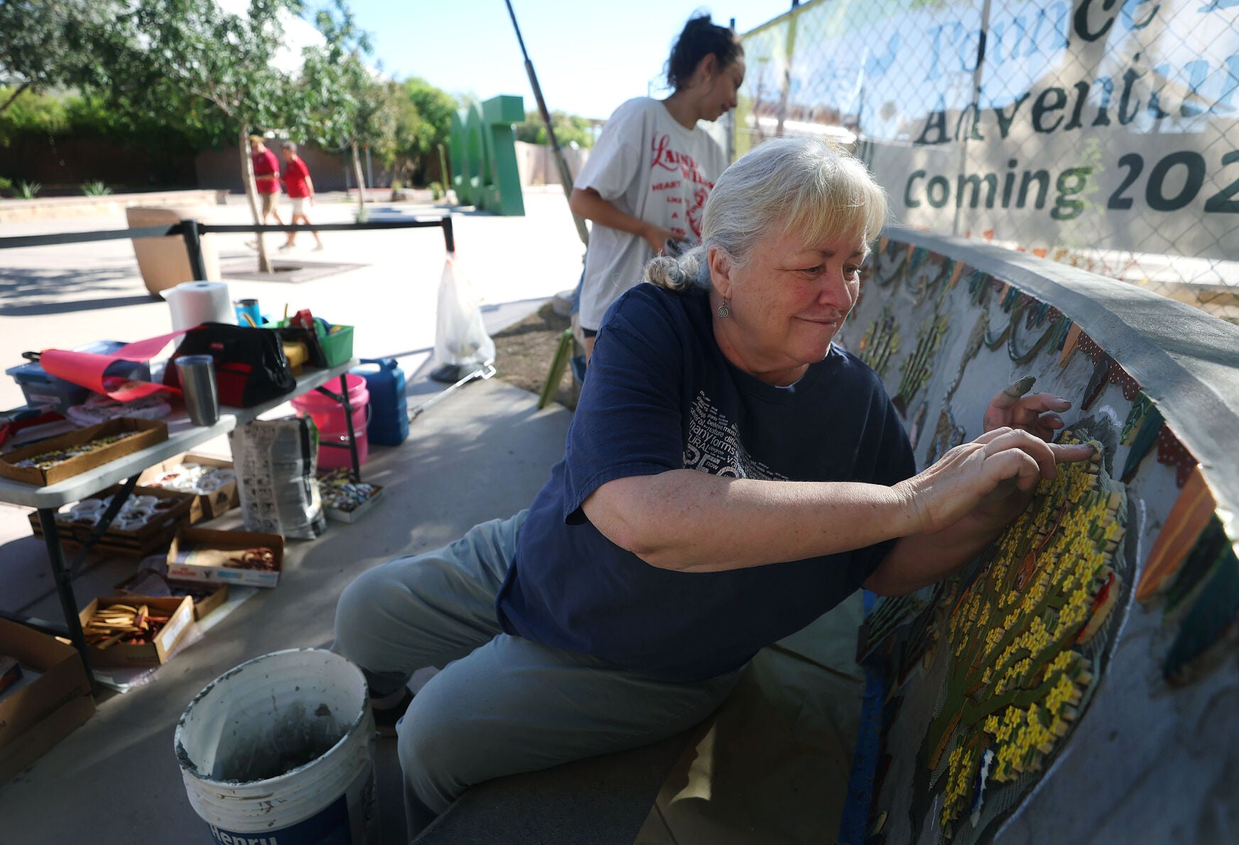 Adding color to pathway at Tucson's Reid Park Zoo