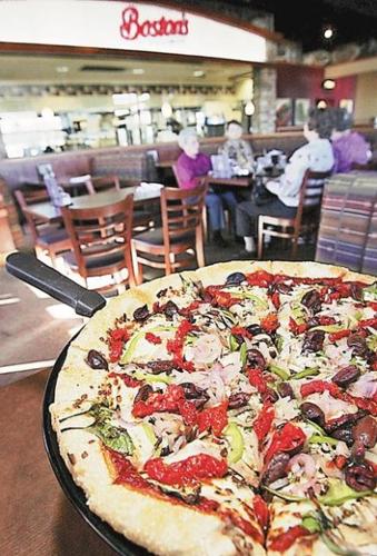 Great toppings but bland crust on these pizzas  