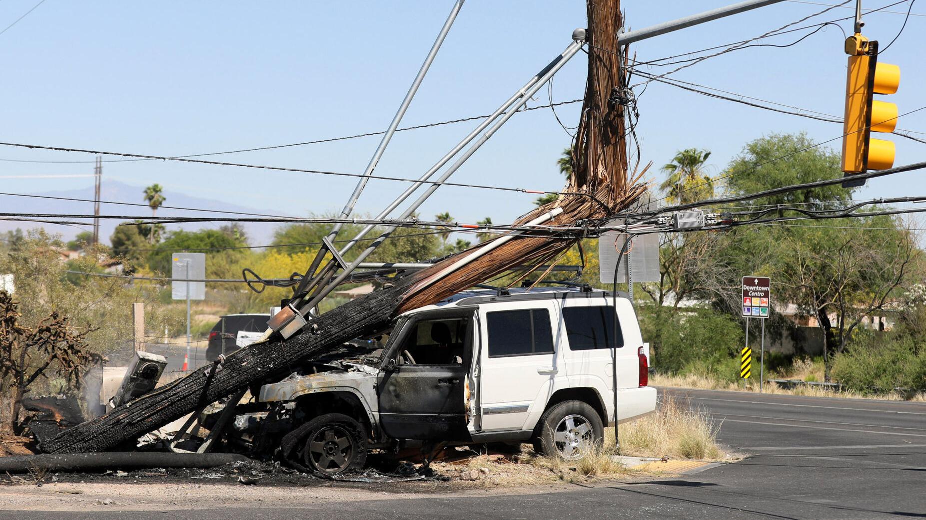 Vehicle crashes into utility pole, shutting down Tucson roadway