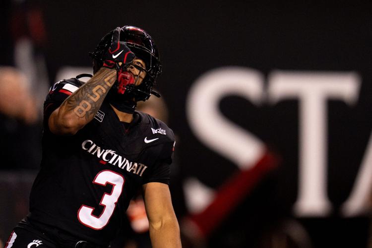 Cincinnati Bearcats running back Cole Tabb (3) reacts to scoring a touchdown in the third quarter of the NCAA football game