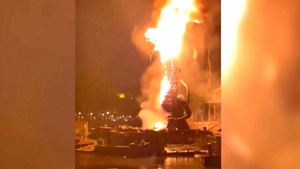 Animatronic dragon bursts into flames during Disneyland show